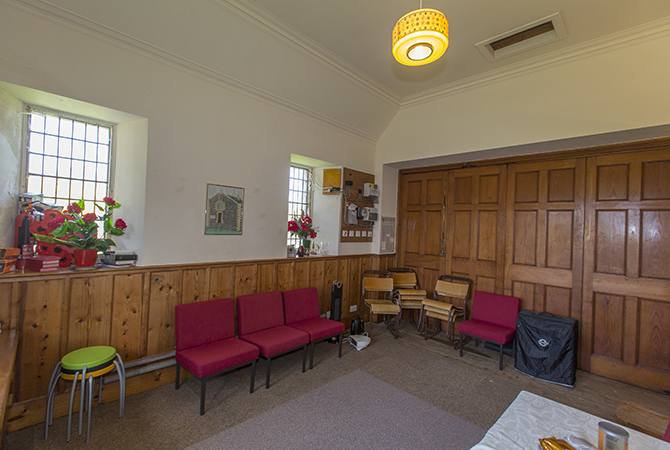 INTERIOR-2-FOLDING-WOODEN-DOORS-ALLOW-DIRECT-ACCESS-TO-CHURCH-WEB-SIZE-1.jpg